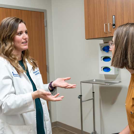 doctor talking to patient