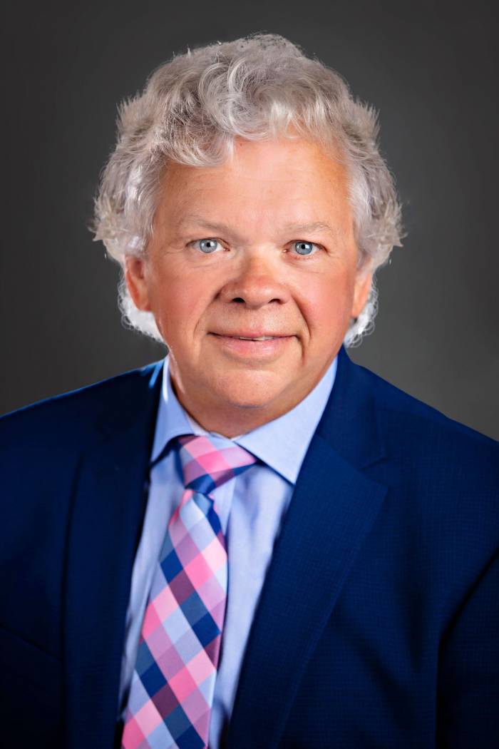 Clark Likness, MD