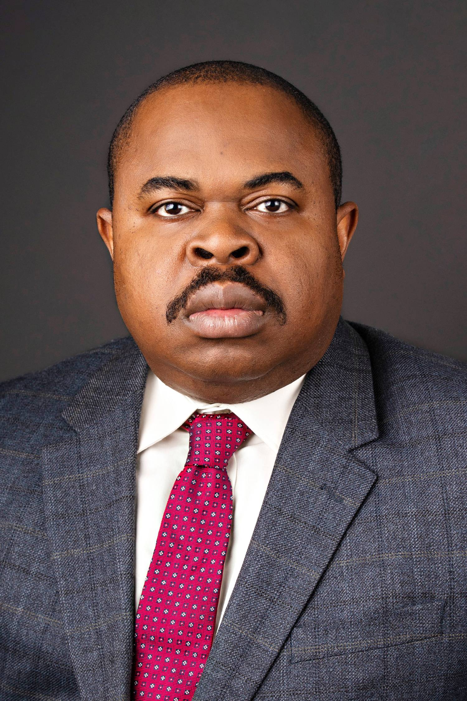 Dr. Amadin Osayomore